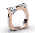 Rose gold colour geometric couple ring with zircon inlay showing angular design pattern