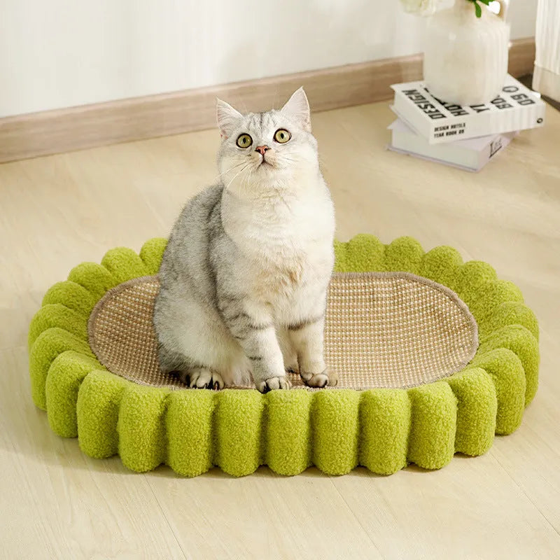 Green oval sisal cat scratch pad showing scratching surface and bowl-shaped lounging area
