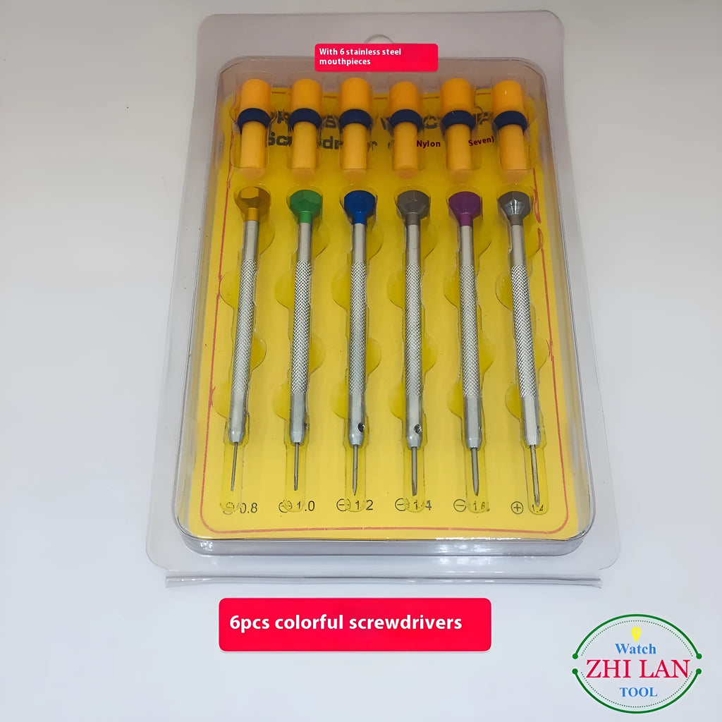 Six colour-coded watch repair screwdrivers with copper handles in an aluminium case.