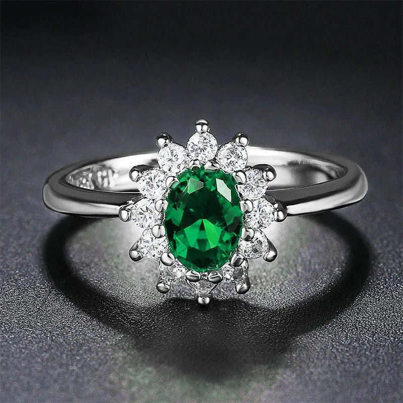 Women's copper ring with flower shape and zirconium inlay, electroplated finish in green, sapphire blue, or pomegranate red.