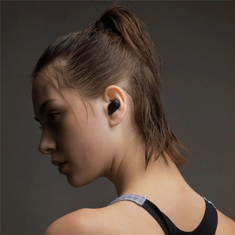 Redmi AirDots black true wireless earbuds with charging case.