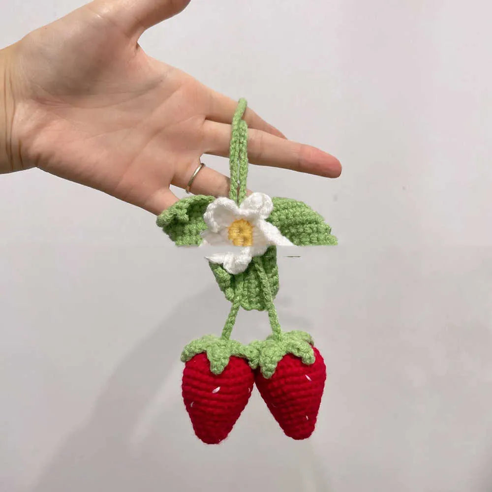Handmade strawberry-shaped weaving pendant for car decoration, made from cotton and hemp.