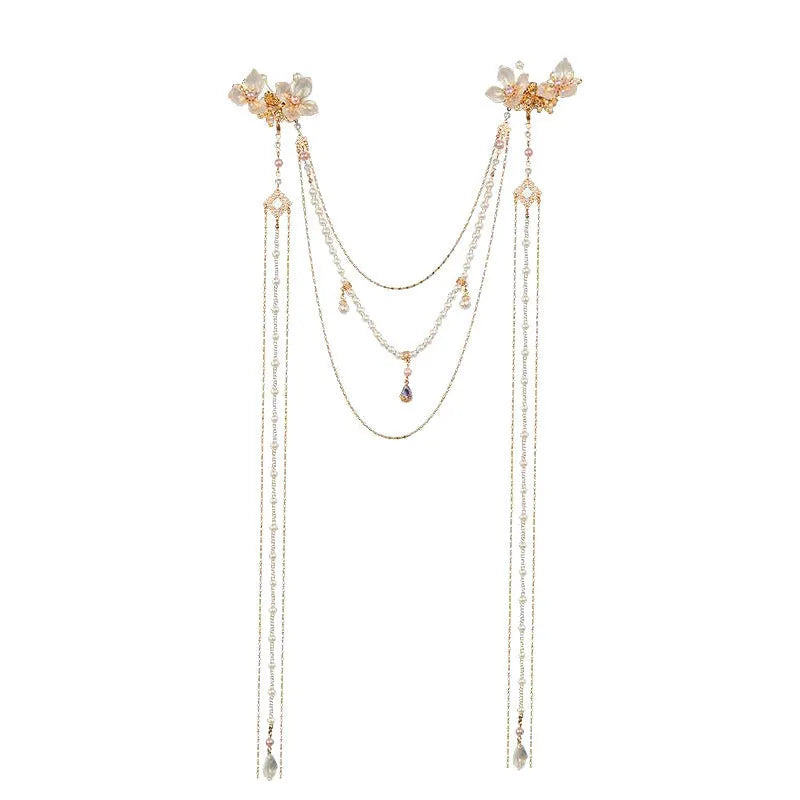 Gold acrylic hairpin with pearl, diamond, and long tassel decorative elements for women's hairstyling.