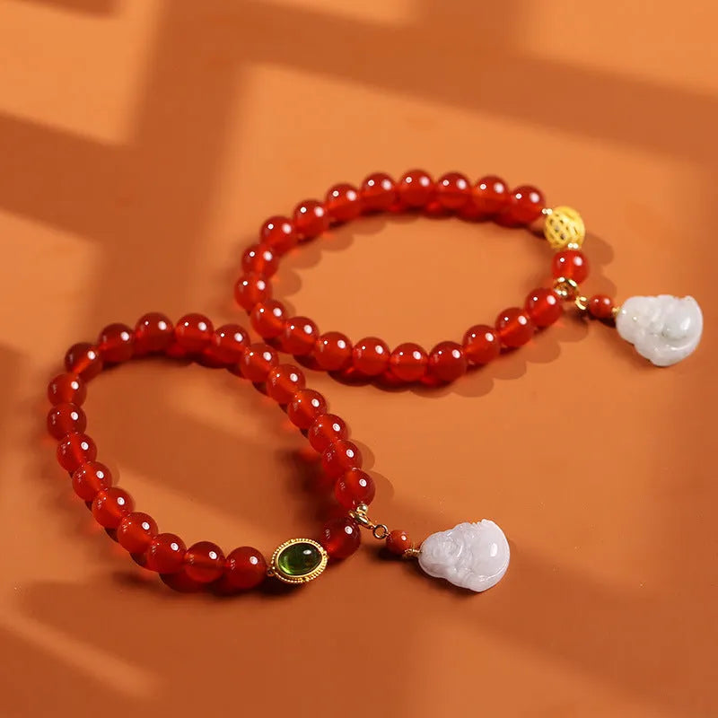 Red agate and amber bracelet with geometric Chinese design and Maitreya Buddha charm