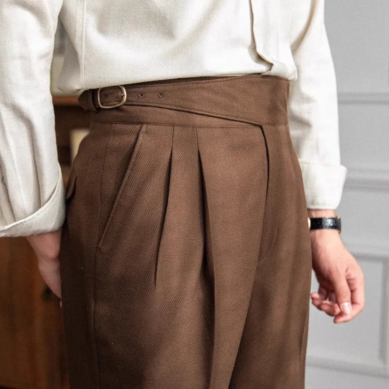 Men's black high waist straight-leg casual trousers on hanger showing waistband and leg cut