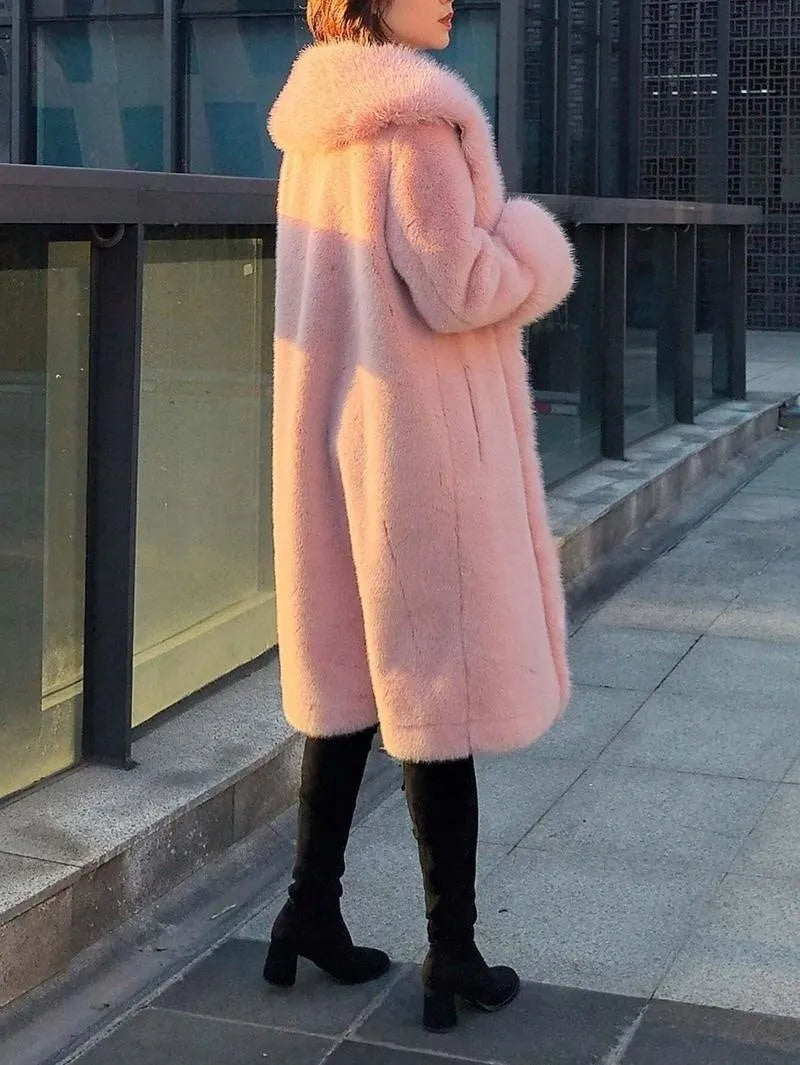 Women's grey thick faux rabbit fur mid-length coat with a fur collar.