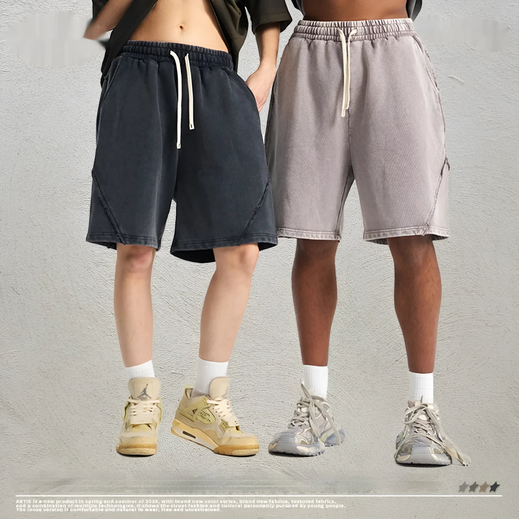 Men's batik washed patch cotton terry shorts in a loose retro street style, shown in batik black.