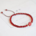 Hand-woven women's bracelet with natural red agate diamond beads in ethnic style design