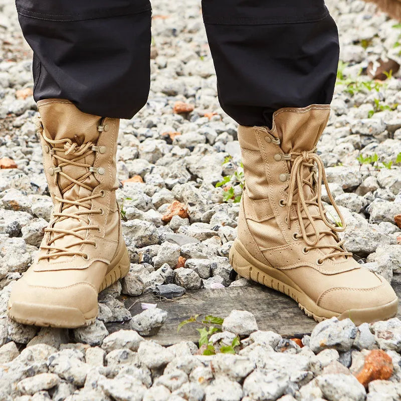 Yulong tactical desert combat boots in black and sand colour on a white background.