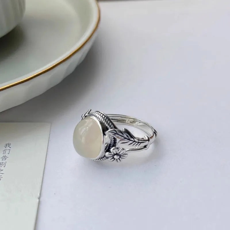 Adjustable copper vintage ring with white chalcedony stone and U-shaped antique design