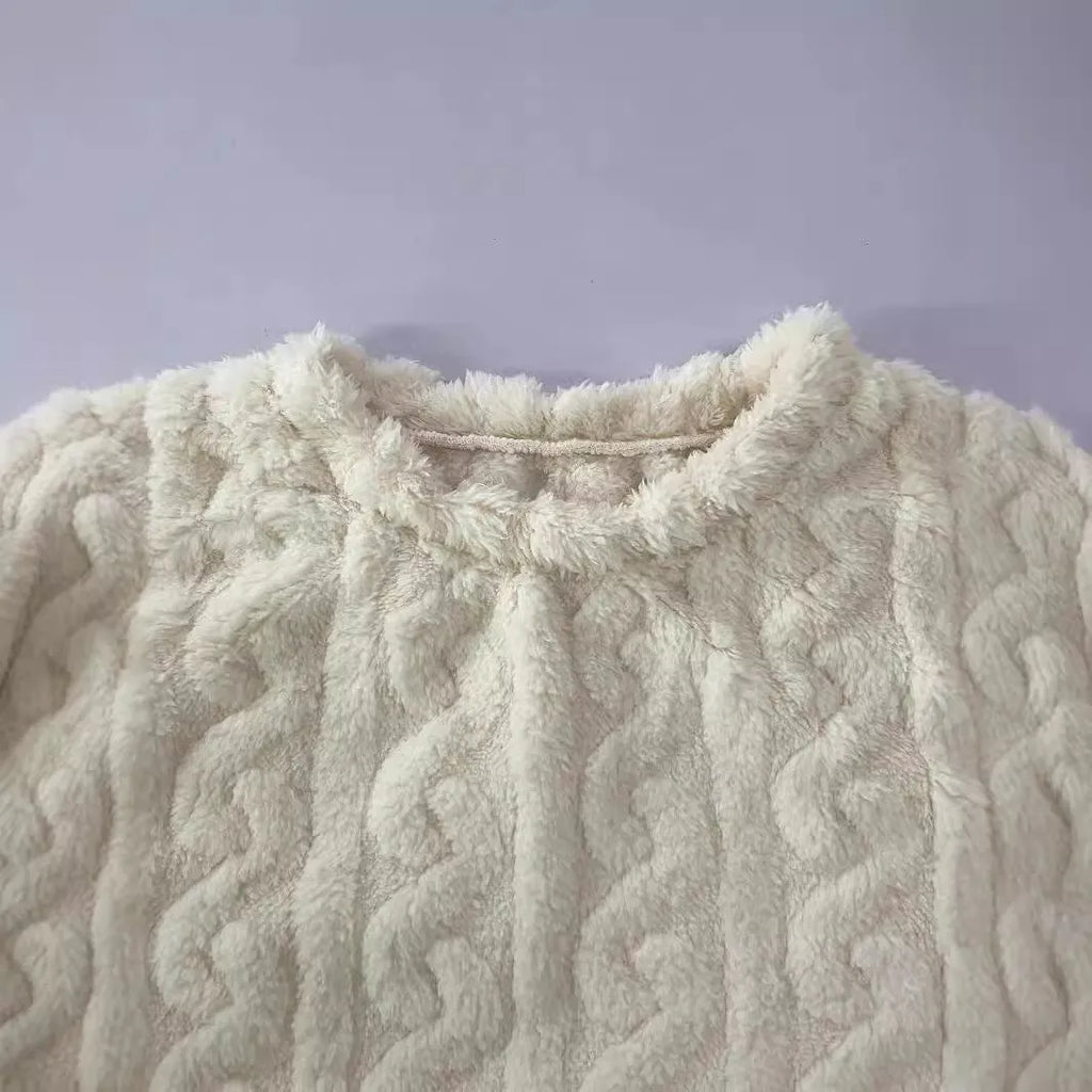 Women's creamy white plush crew neck two-piece lounge set with long sleeves and full-length trousers.