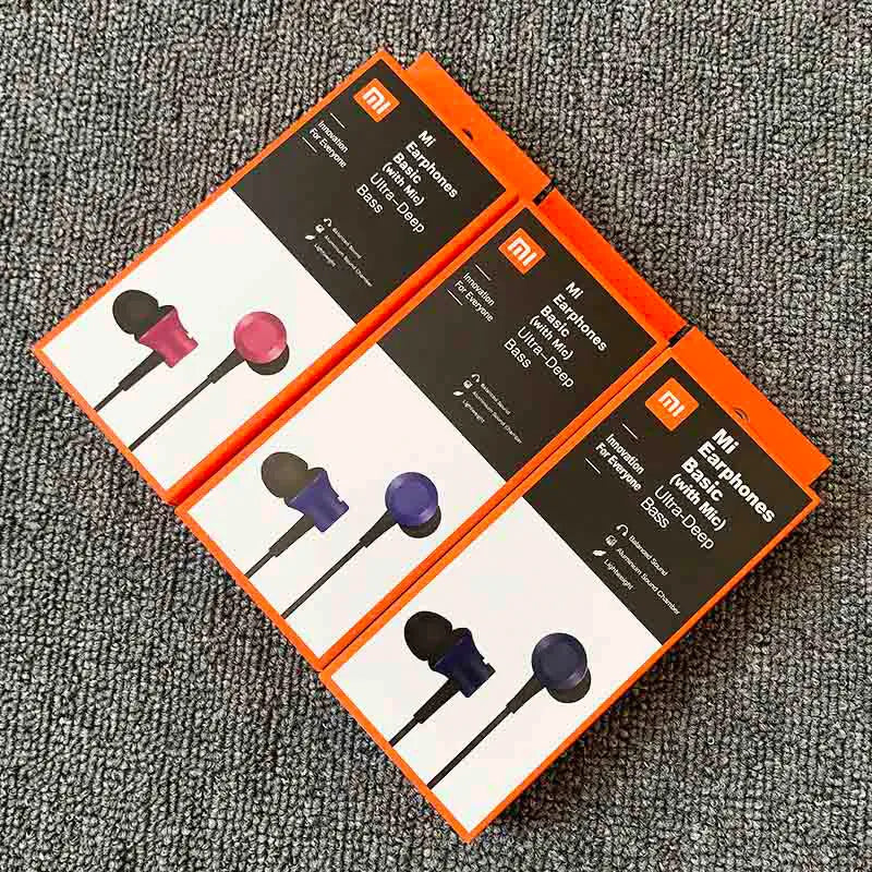 Black, blue, and red wired in-ear headphones showing their 3.5mm audio plug.