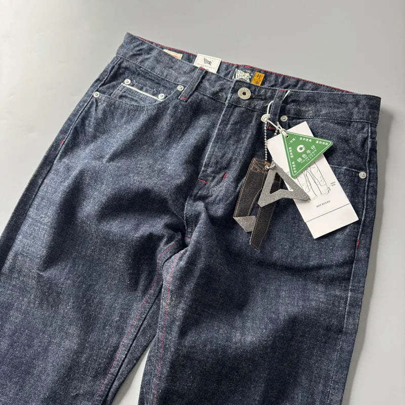 Men's primary colour straight leg denim jeans with a mid waist fit on a neutral background.