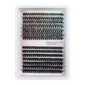 Box of messy mixed false eyelashes showing varied lash densities and high imitation material texture.