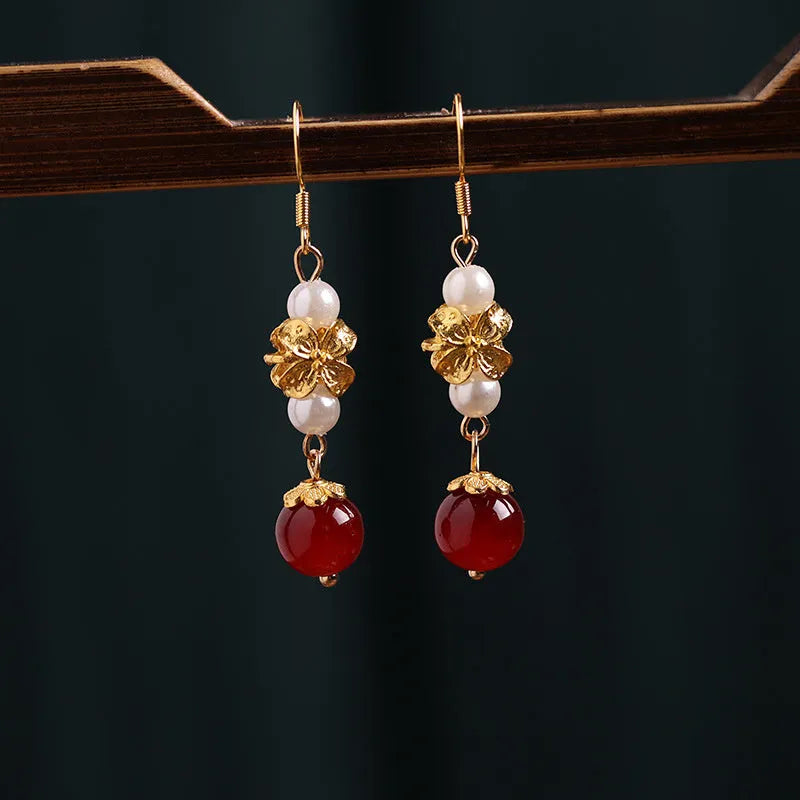 A pair of geometric vintage alloy earrings with an antique design inspired by Han cheongsam court style.