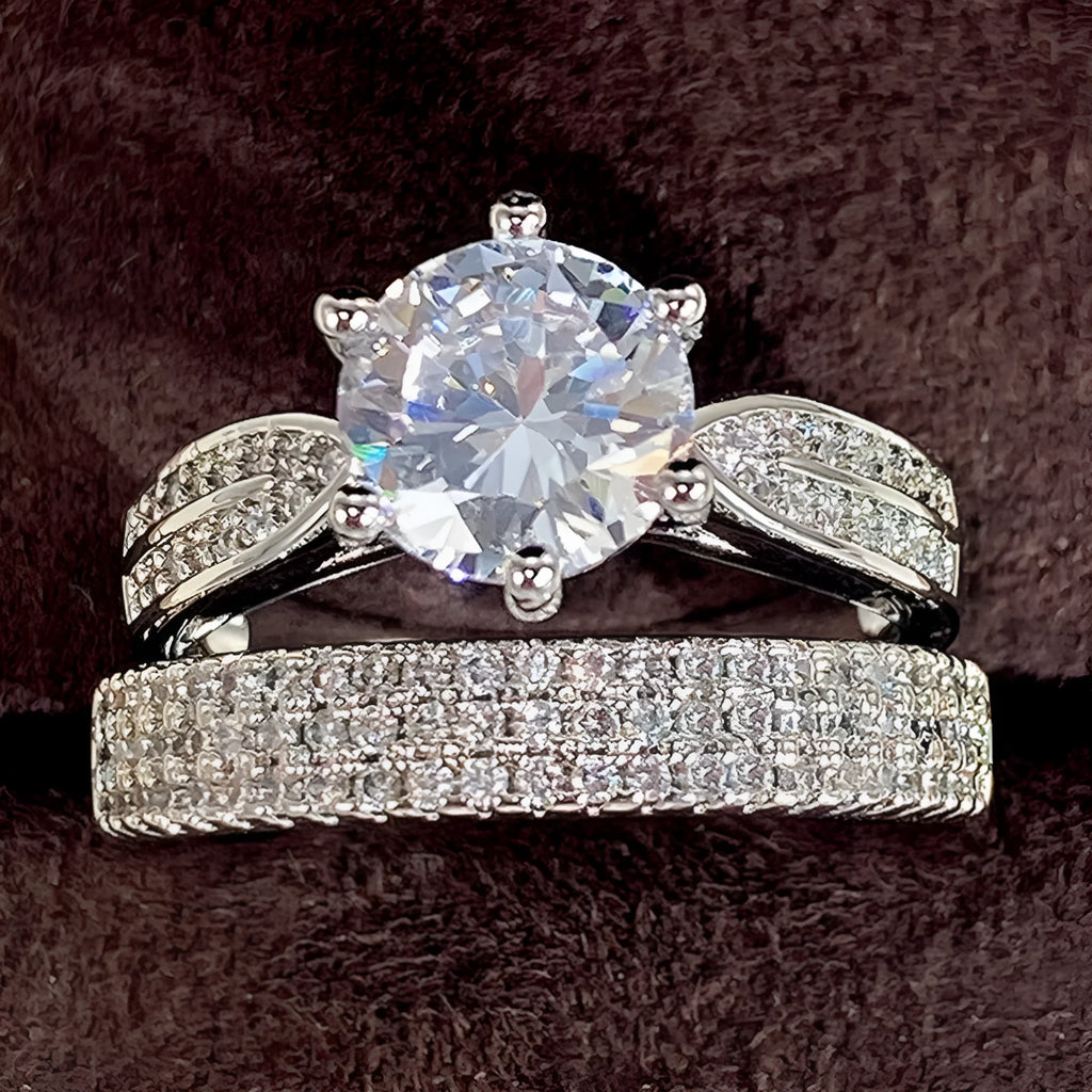 White gold colour alloy wedding ring bracelet with geometric round design showing seven available ring sizes