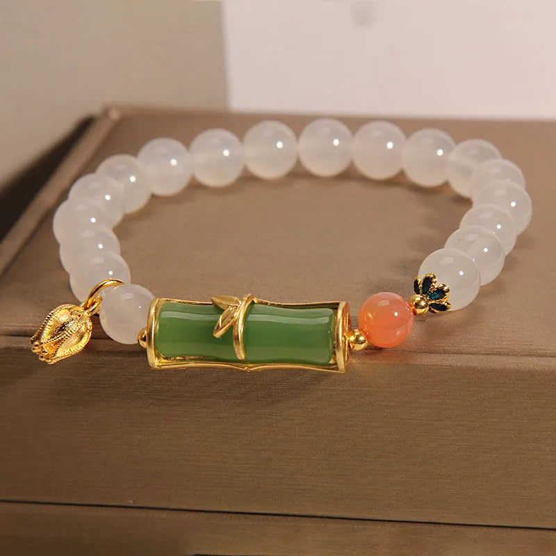 Women's Chinese style bamboo beaded bracelet with white agate jasper charm and natural jade materials