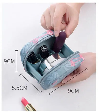 Blue cloth cube makeup storage bag with plain pattern, open to show space inside
