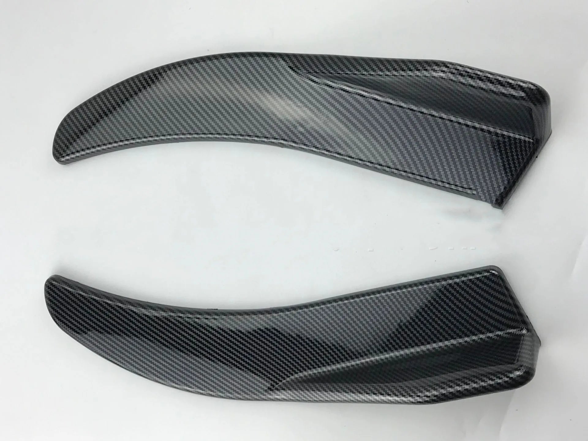 Car front and rear deflector light trim in carbon fibre finish for General Motors vehicles