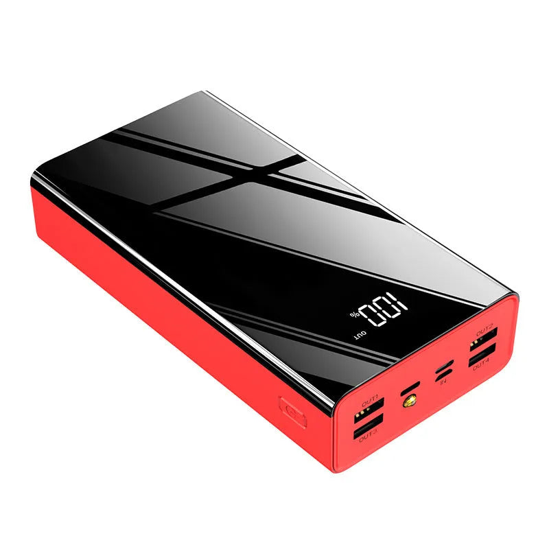 Large black and red 40000mAh power bank showing LCD screen displaying battery percentage.