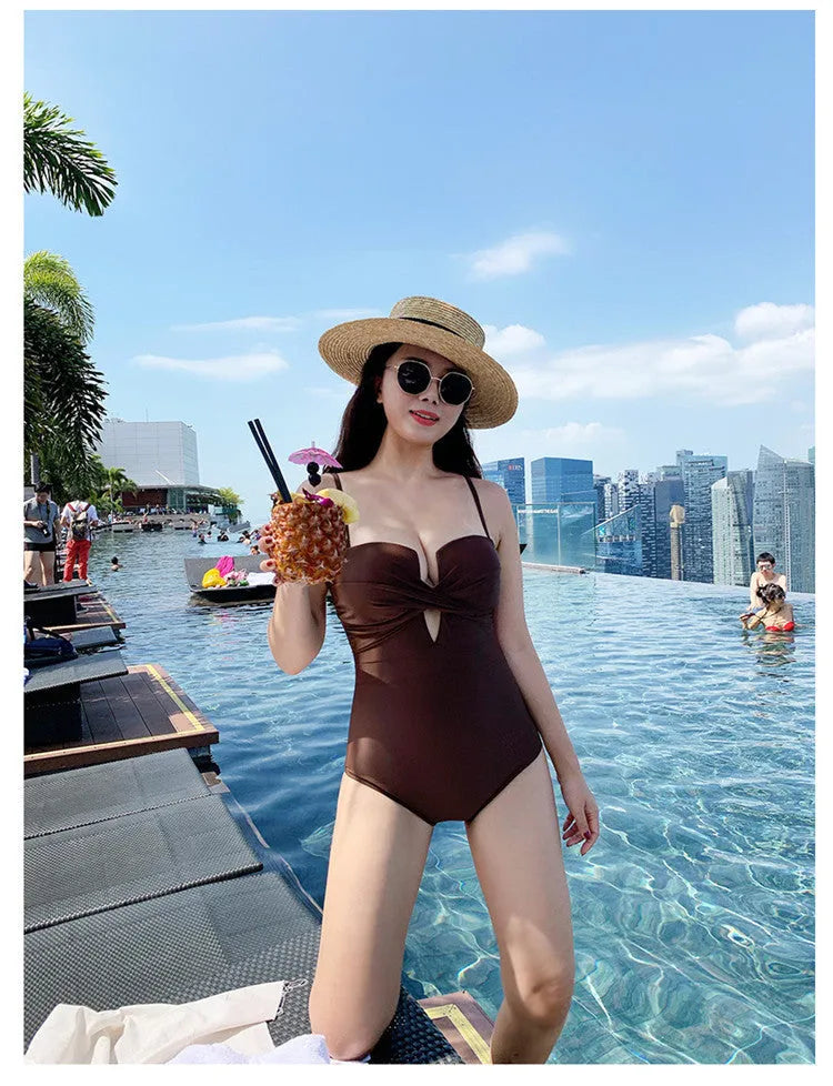 Ins Style women's solid colour push-up one-piece swimsuit with spaghetti straps in brown.