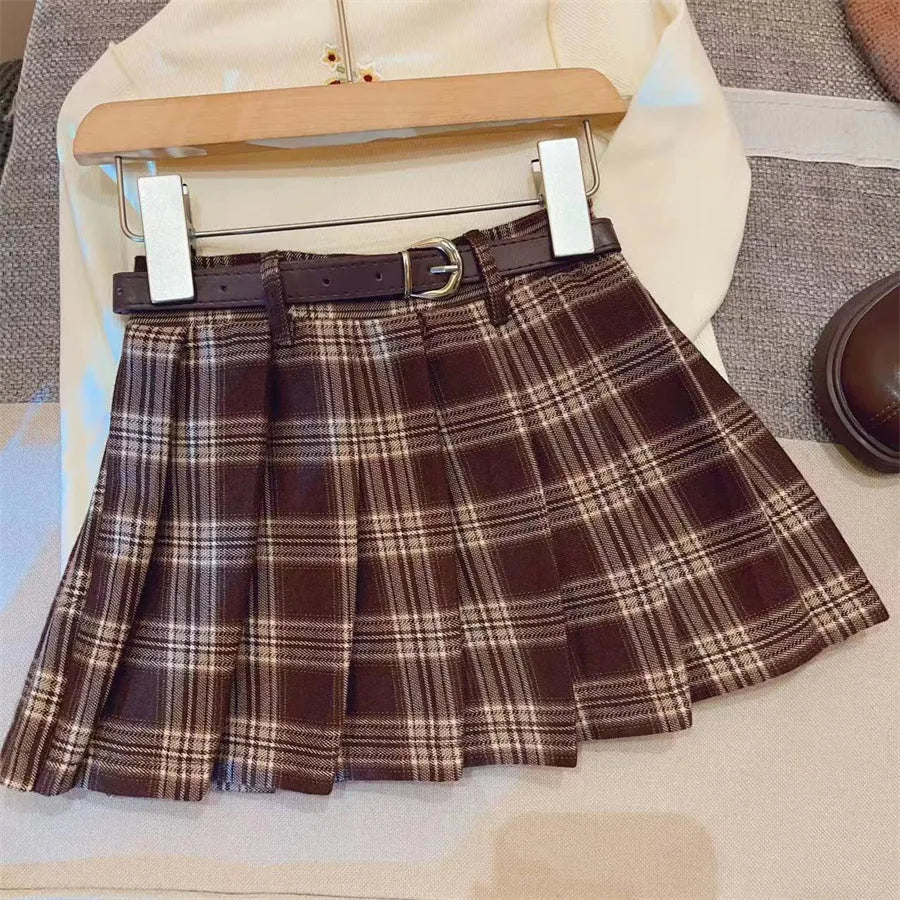Children's plaid pleated skirt in cotton blend fabric with A-line silhouette available in multiple height options