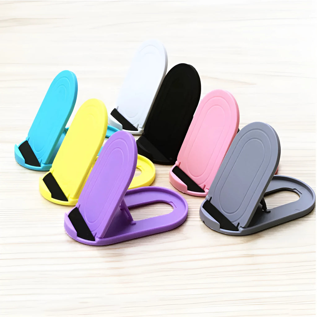 Plastic mobile phone stand with lazy bracket design shown in multiple colour options on a desk