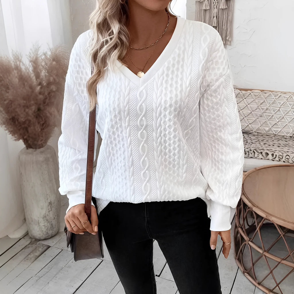 Milky white long sleeve T-shirt with 3D pattern design and loose fit silhouette