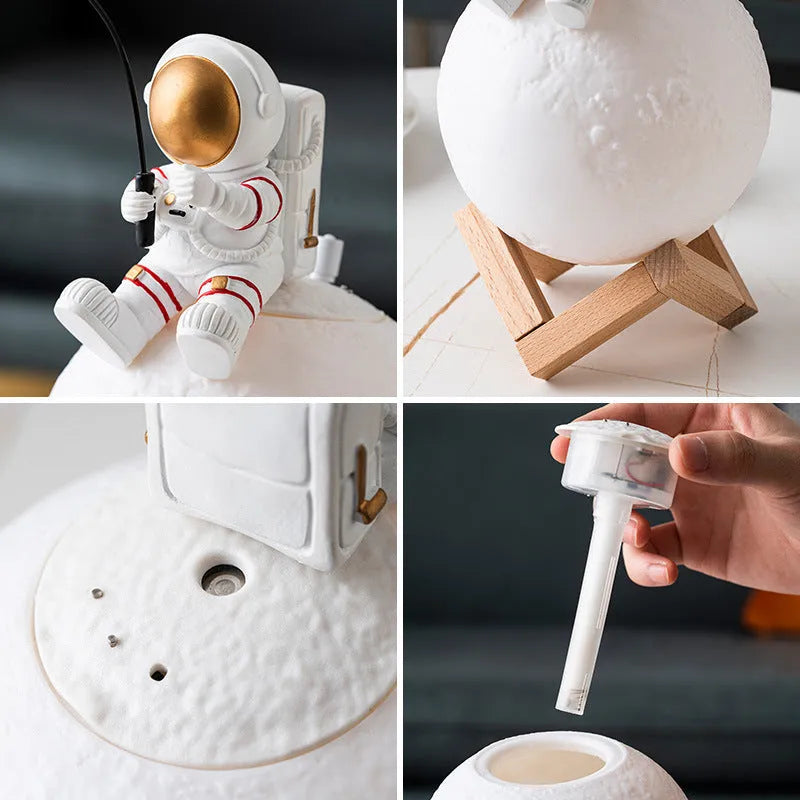 Gold resin astronaut figurine humidifier night light with wood base, 28 cm tall, on a desk