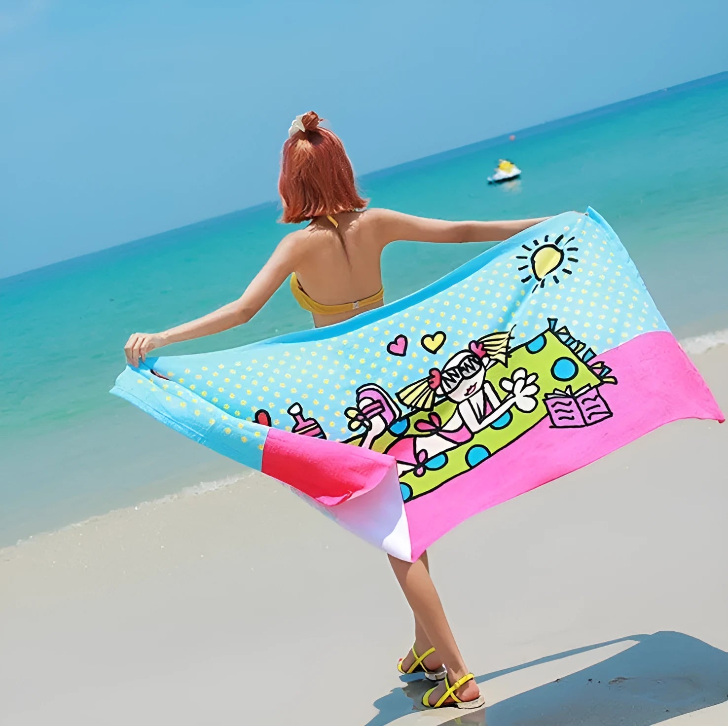 Flower-coloured swimming absorbent microfiber towel 150x70cm on a beach background