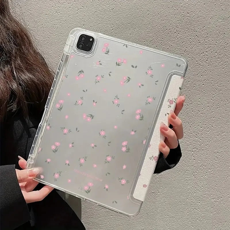 Transparent floral patterned tri-fold hard case for Apple iPad showing stand angle.