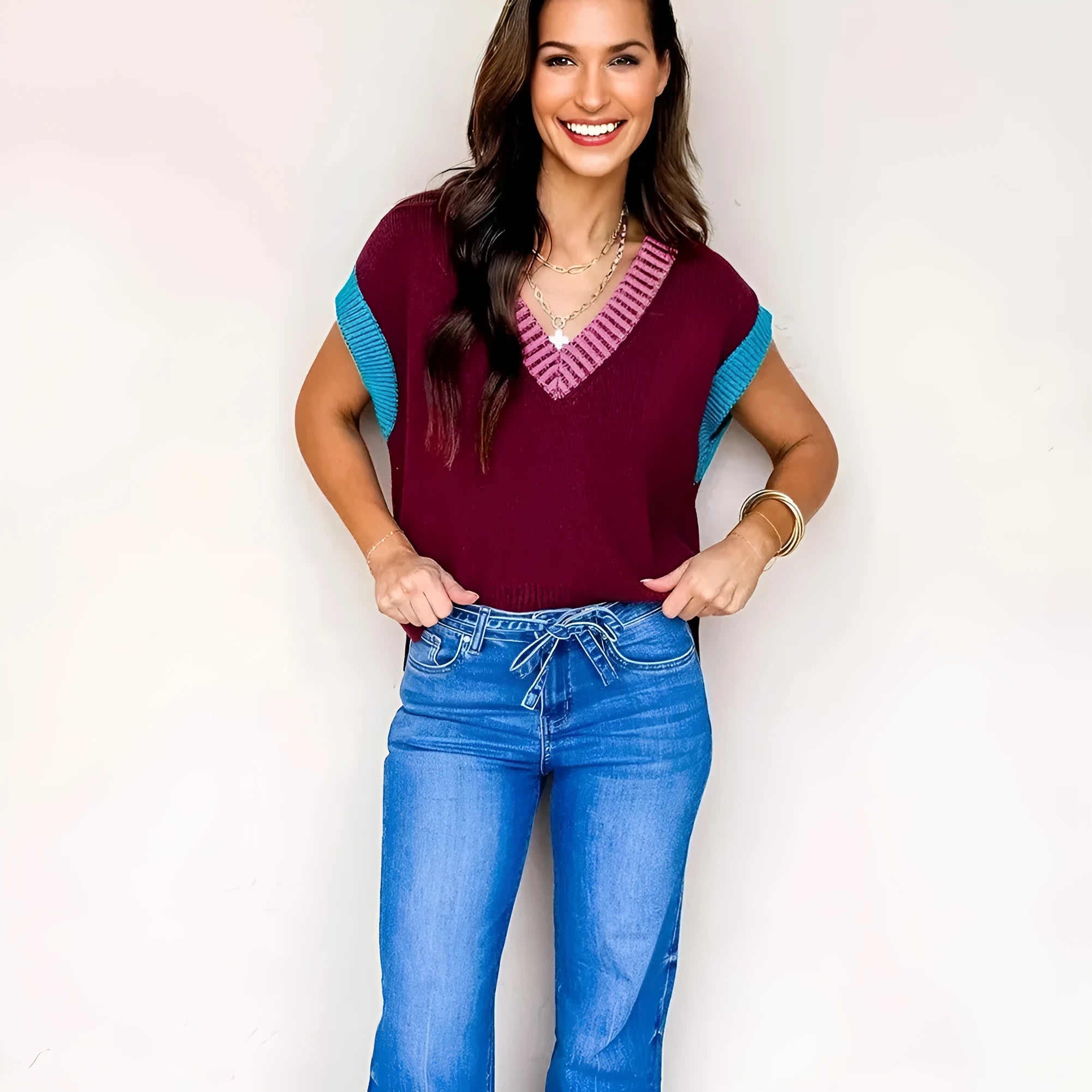 Burgundy women's loose sweater with V-neck and contrast trim cuffed short sleeves