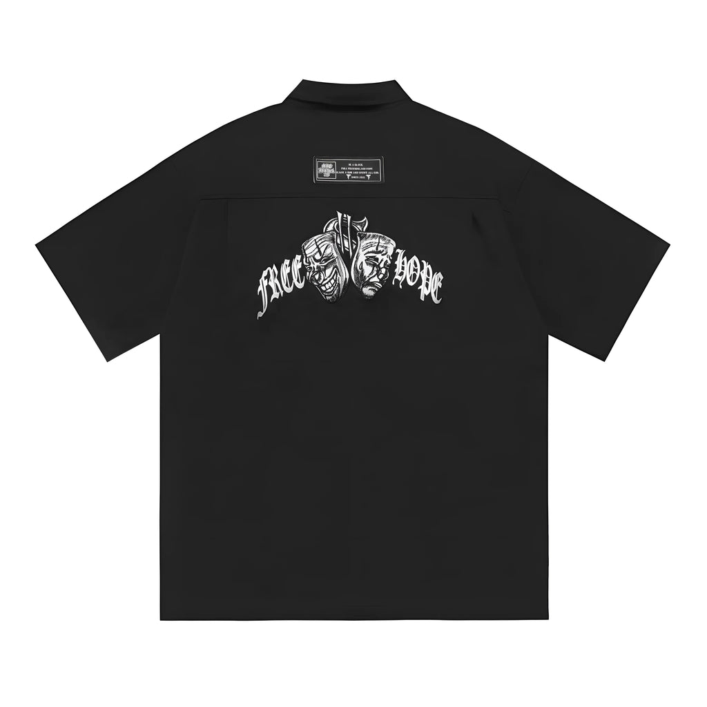 Men's black cotton blend loose fit shirt with half sleeves and embroidered detail.