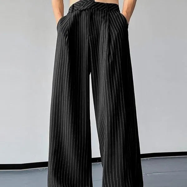 Black men's trousers with vertical striped pleated design showing elastic casual wear