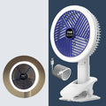 White and blue plastic rechargeable clip fan with USB cable, 29x18cm, clamped on a desk edge