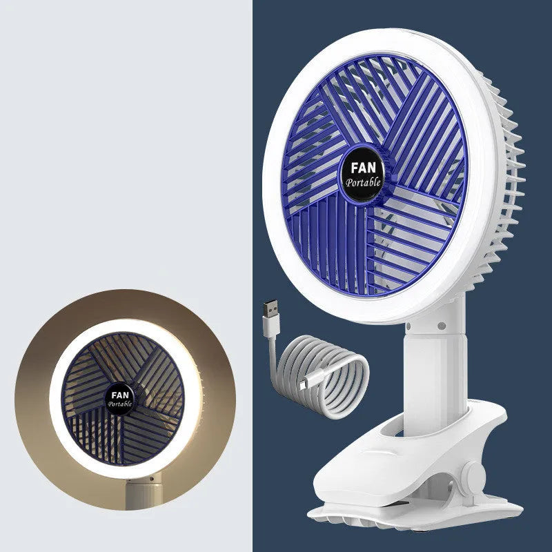 White and blue plastic rechargeable clip fan with USB cable, 29x18cm, clamped on a desk edge