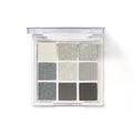 Smoked nine-colour eye shadow palette showing white, silver, black and grey shades