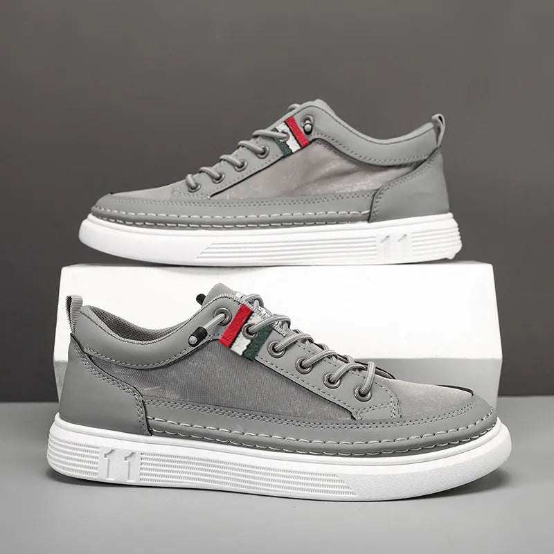 Men's black high-top canvas sneakers with a bandage style, round toe, and PVC sole.