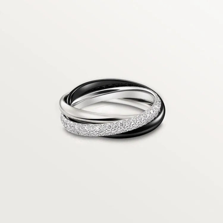 Geometric U-shaped silver couple ring with full diamonds on a black background.