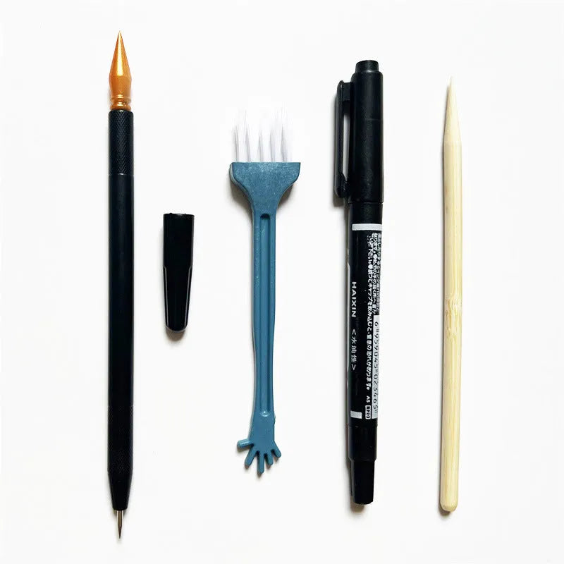 Scratch art repair tool set with scraper pen, brush, repair solution bottle, and bamboo stick.