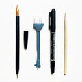 Scratch art repair tool set with scraper pen, brush, repair solution bottle, and bamboo stick.