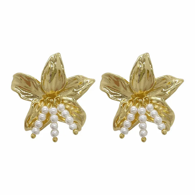 Gold H1795 colour exaggerated pearl flower earrings with metal construction and floral design elements