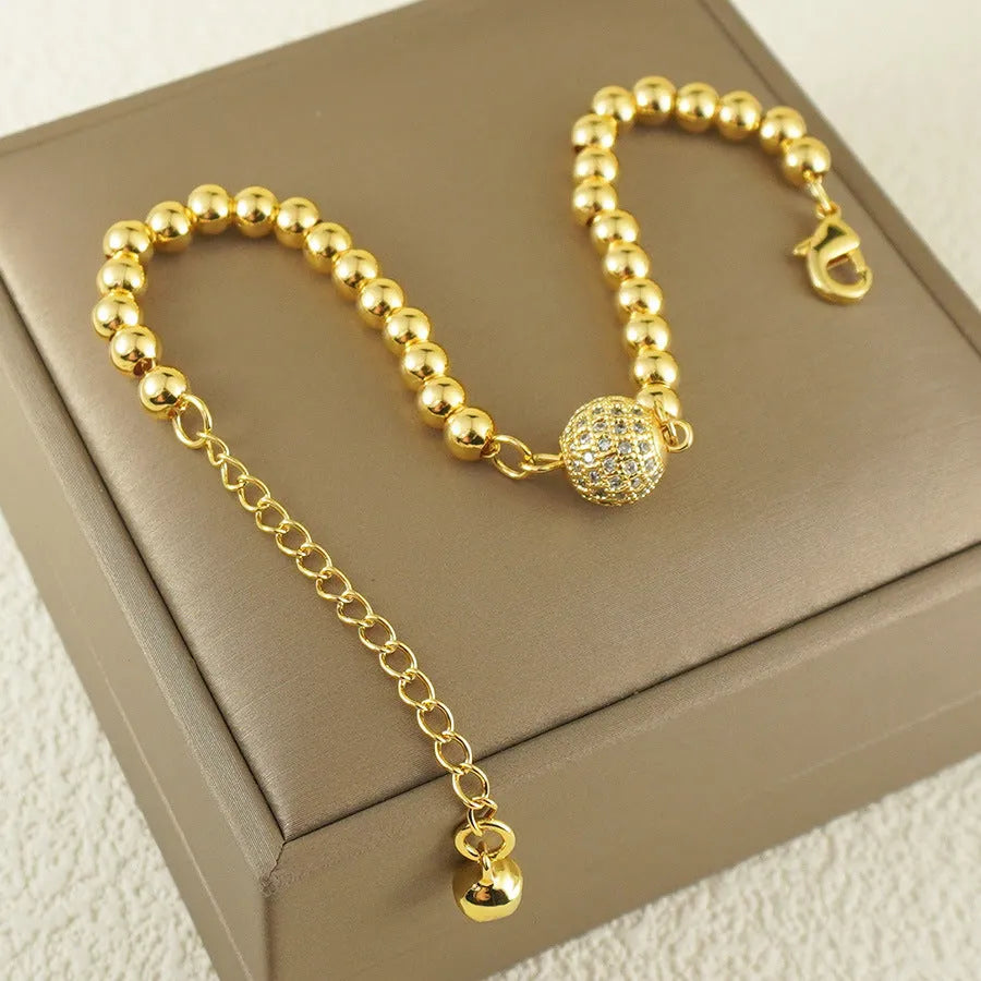 Women's copper bracelet with single zircon ball in heart-shaped Arabic style design