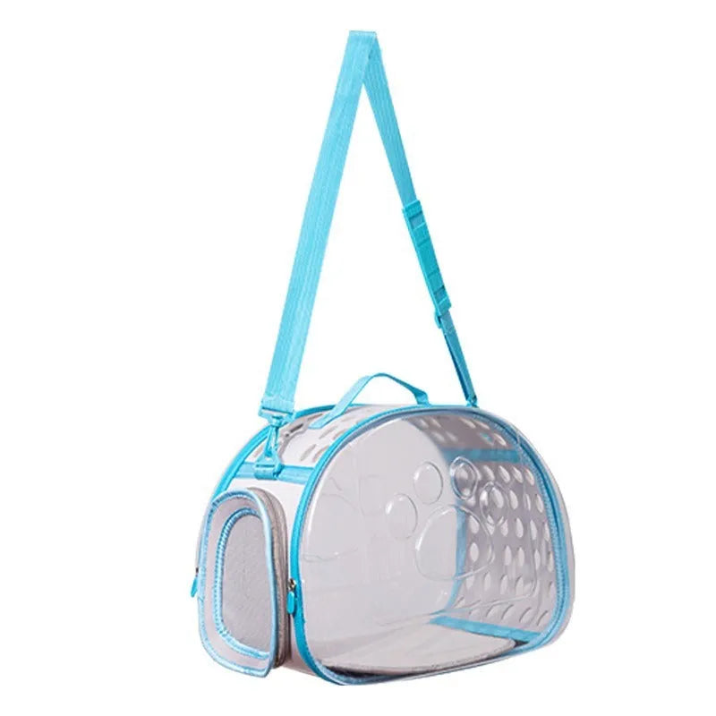 Transparent hard-shell space capsule backpack for a cat, shown in a choice of colours including grass green and pink.