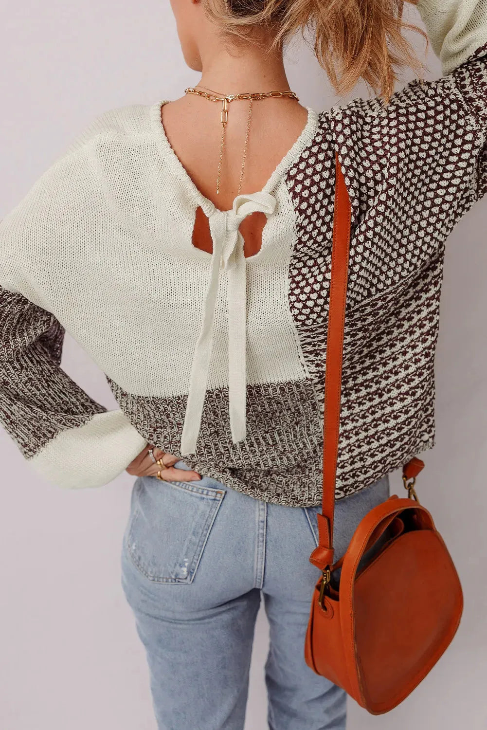 Dark khaki women's loose sweater with back tie and drop shoulders