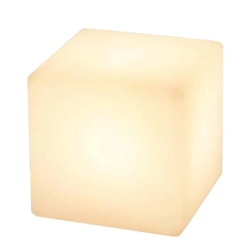 White square LED cube garden light stool with modern design, shown outdoors.