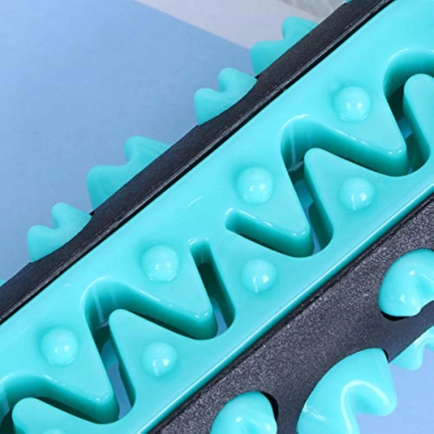 A blue natural rubber dog dental chew toy shaped as a textured stick, measuring 15cm long.