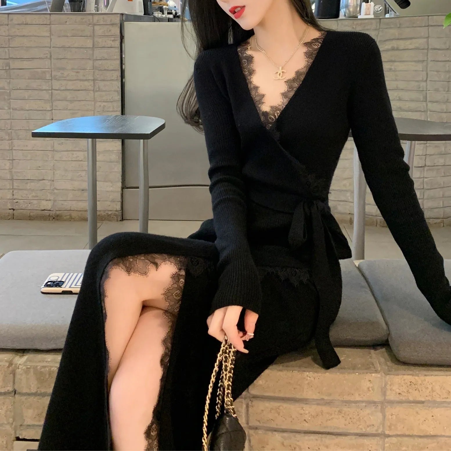Black slim fit woolen skirt with princess dress styling on mannequin