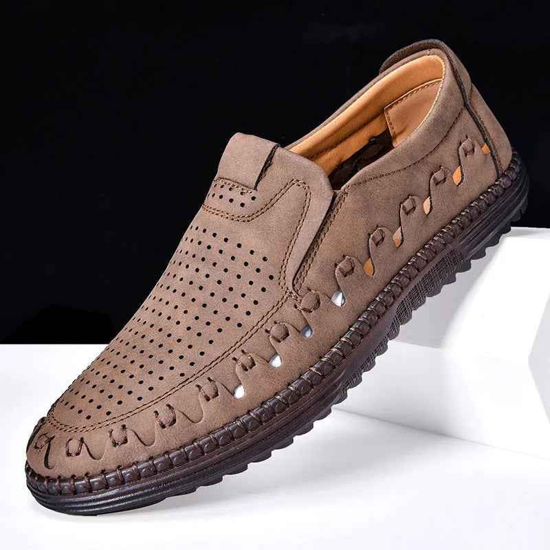 Men's brown slip-on casual shoes with round toe and visible sewing construction on artificial PU upper