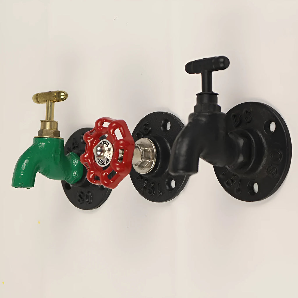 Modern water pipe style metal towel rack hook mounted on a wall in black finish.